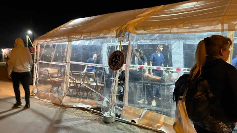 Pilgrims in a medical tent